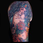 green taro god full sleeve tattoo colorful done by female tattoo artist Jessi Lawson