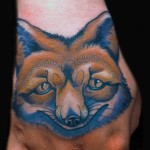 red Fox Hand Tattoo done by female tattoo artist Jessi Lawson